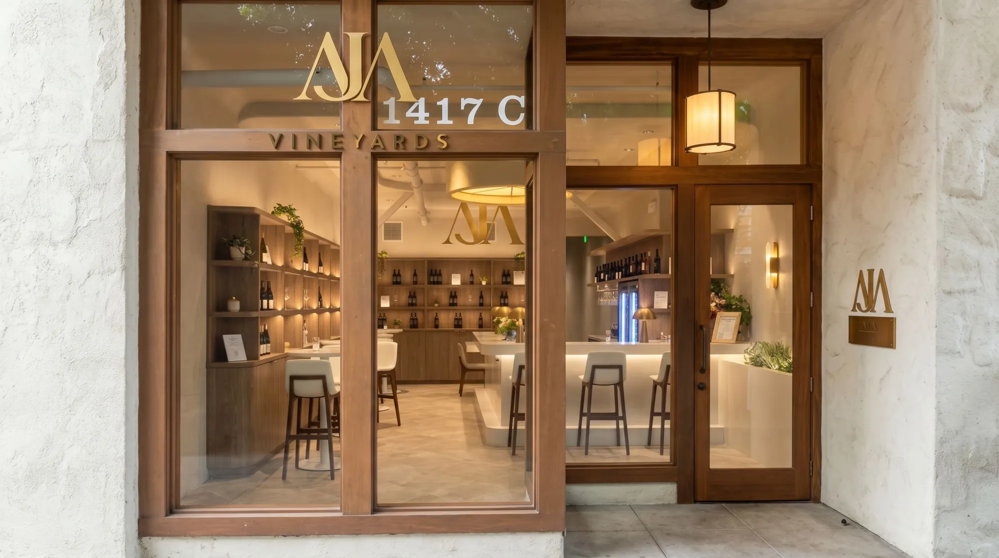 The AJA Vineyards tasting room storefront in Santa Monica, doors open to the bar